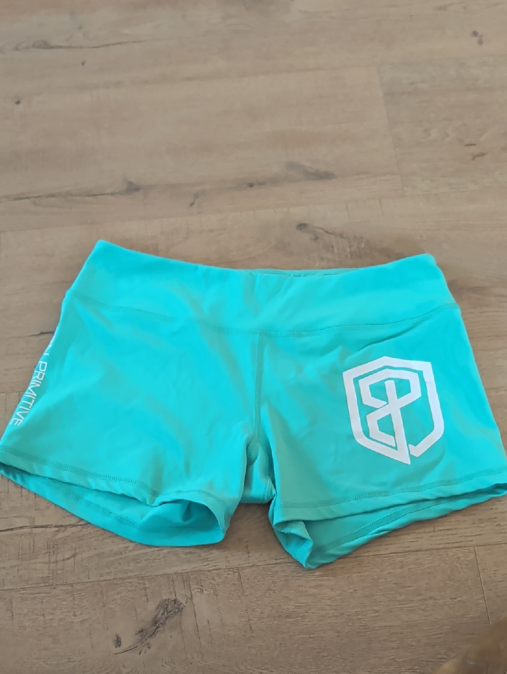 Born Primitive Teal Performance Shorts with White Logo